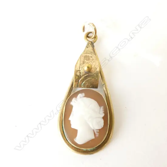 VINTAGE BRASS CAMEO PENDANT