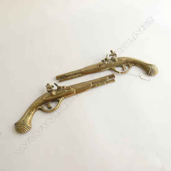 VINTAGE PAIR OF BRASS FLINT LOCK WALL HANGERS