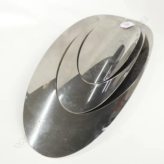 GRADUATED TRIO OF ELLIPSE STAINLESS STEEL TRAYS BY ALESSI - LARGEST L. 400MM