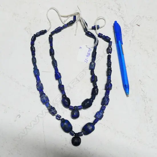 2 STRINGS OF AFGHANI HAND-CARVED LAPIS LAZULI BEADS