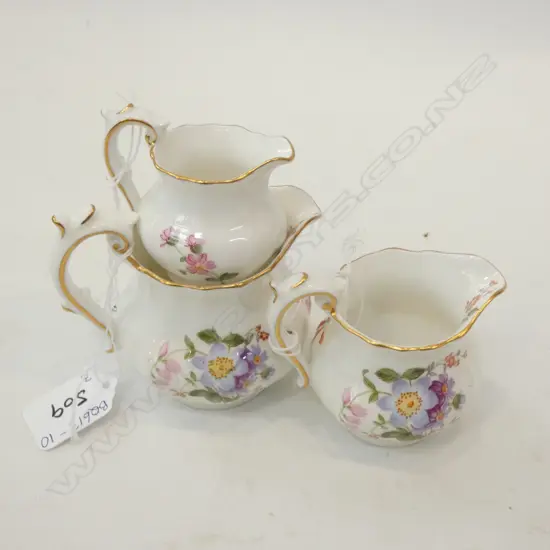 ROYAL CROWN DERBY - DERBY POSIES 3 SM GRADUATED JUGS. LARGEST H. 80MM