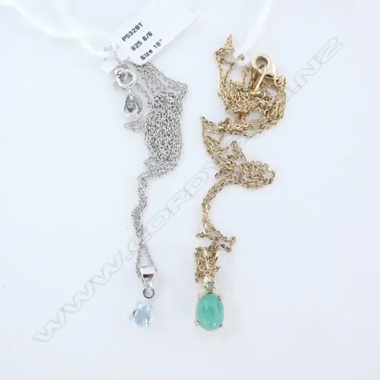 2 COSTUME JEWELLERY PENDANTS; 1 GOLD, 1 SILVER