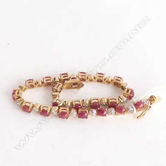 18CT GOLD PLATED AND RUBY TENNIS BRACELET (LOW GRADE RUBY CABOCHONS)