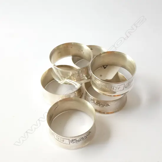 6 STG SILVER NAPKIN RINGS