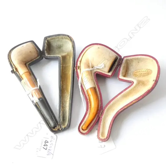 2 CASED MEERSCHAM PIPES ONE WITH AMBER STEM