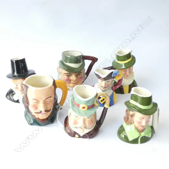 SEVEN SMALL TOBY JUGS - TALLEST 65MM