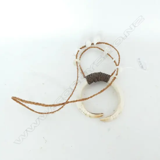 FIJIAN BOAR TUSK PENDANT WITH HANDWORKED FIBRE ROPE