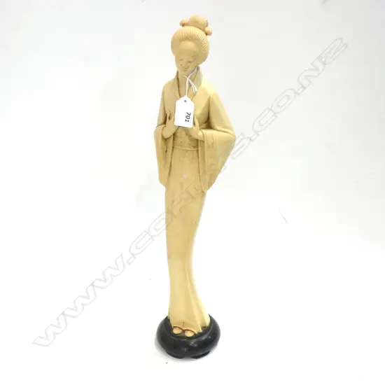 ORIENTAL STANDING FIGURE OF A WOMAN