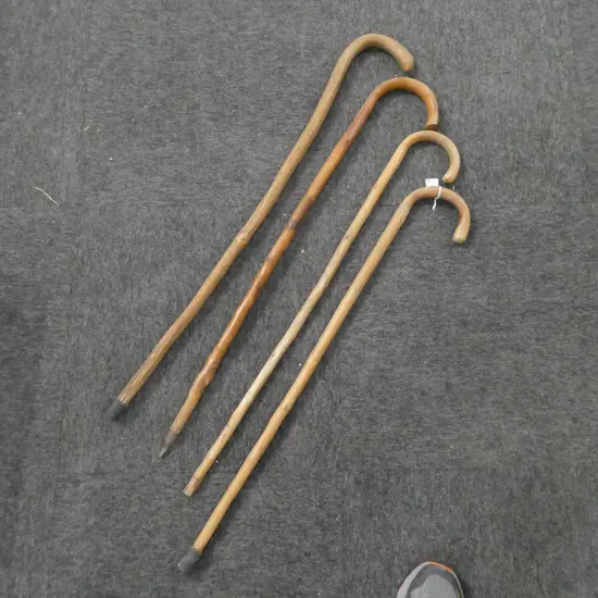 4 VINTAGE WALKING STICKS L. 870MM