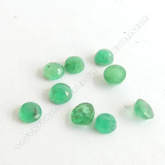 NINE ROUND FACETED EMERALDS - 3CT TOTAL