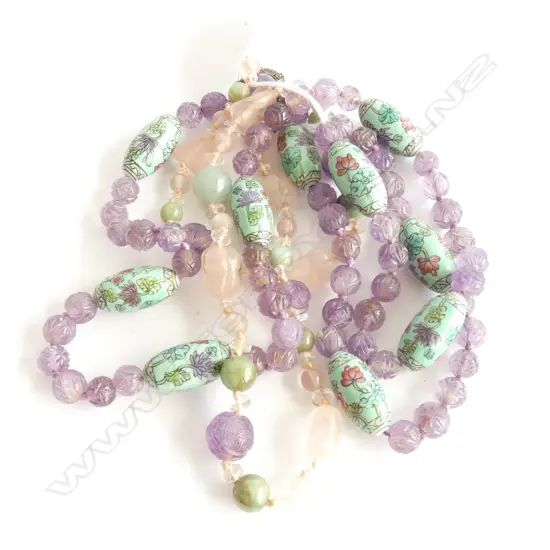 2 CARVED AMETHYST NECKLACES 