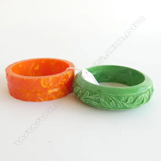 TWO VINTAGE PLASTIC BANGLES