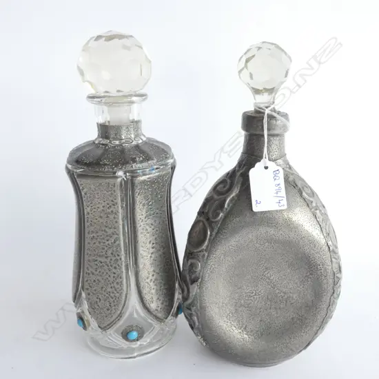 2 STUDIO MADE ARTS & CRAFT DECANTERS WITH PEWTER OVERLAY & TURQUOISE LIKE CABOCHONS TO ONE H. 210MM  