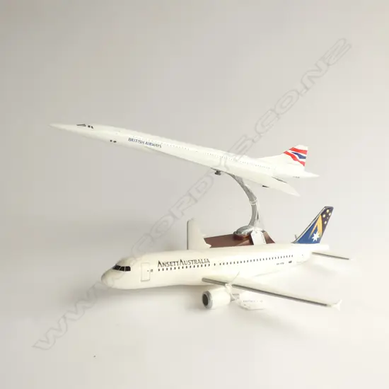 2 MODEL PLANES - BRITISH AIRWAYS CONCORD ON WOODEN STAND (L. 470MM) & ANSETT AUSTRALIA PLANE (L. 360MM)