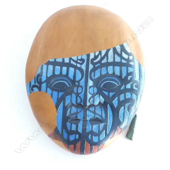 CARVED AND PAINTED WOODEN WALL MASK. POUNAMU EARRING. L. 250MM