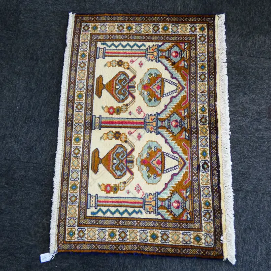 (21M) PERSIAN H/KNOTTED TORKAMAN RUG 890 X 560mm