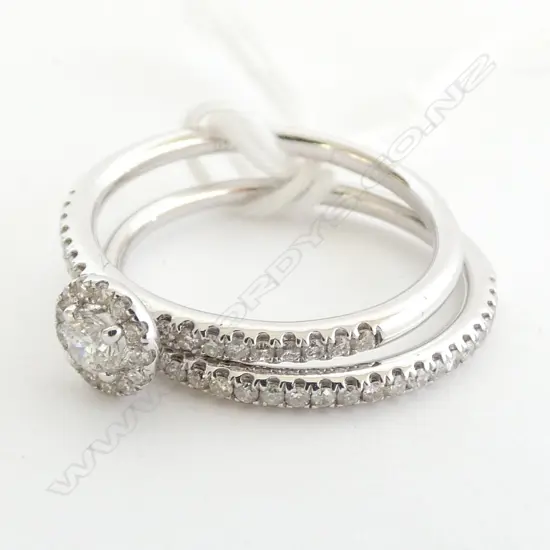 PAIR 18CT WHITE GOLD AND DIAMOND RINGS