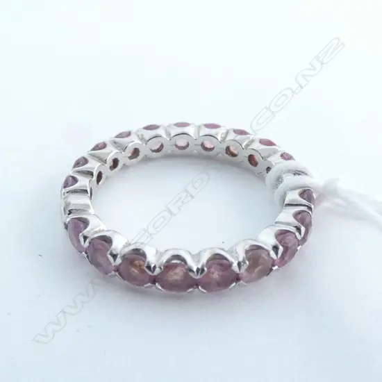 18CT WHITE GOLD AND PINK SAPPHIRE BAND (VALUATION)