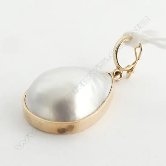 9CT GOLD AND PEAR SHAPED MABE PEARL ENHANCER