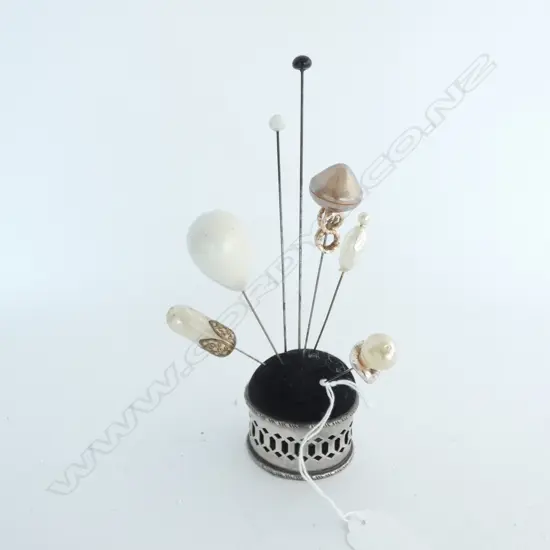 SILVER PLATE PIN CUSHION WITH 7 ASSORTED HAT PINS 