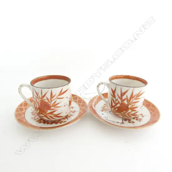 PAIR OF KANGXI-STYLE IRON RED & GOLD DEMI CUPS & SAUCERS...