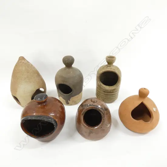 6 CERAMIC SALT PIGS .