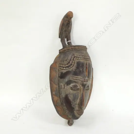 TRIBAL AFRICAN WOODEN CARVED MASK  WITH BIRD ON TOP - H. 410MM