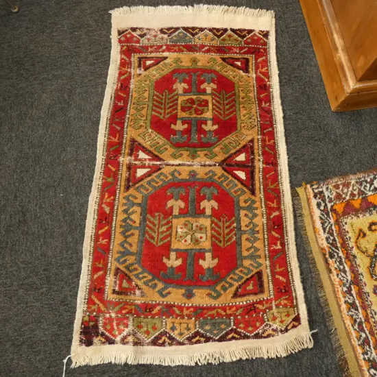 HAND WOVEN ALL WOOL RUG 1000 X 550MM...