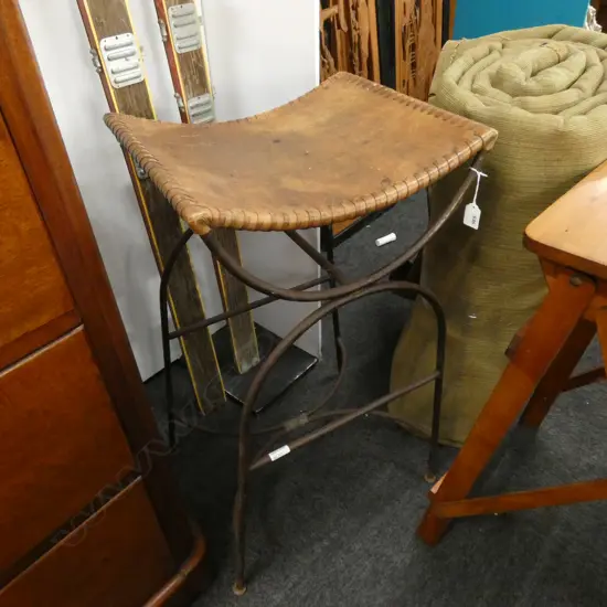 VINTAGE LEATHER TOPPED STOOL - METAL LEGS. SEAT 425 X 360MM H. 790MM