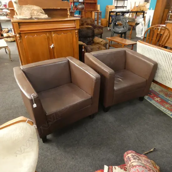 PR BROWN LEATHER ARM CHAIRS...