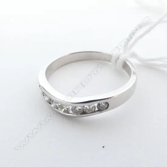 9CT WHITE GOLD AND DIAMOND BAND 