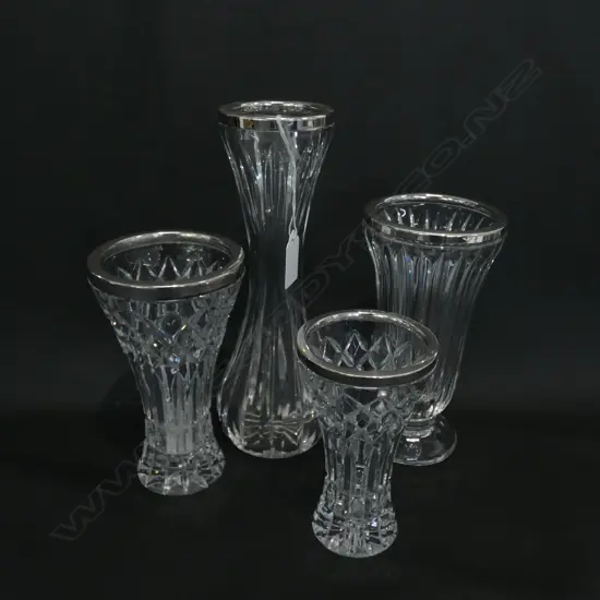 FOUR CUT GLASS 925 SILVER RIMMED VASES. TALLEST H. 250MM