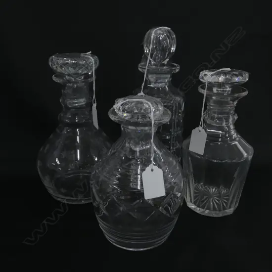 4X ANTIQUE CRYSTAL AND GLASS DECANTERS ( ONE STOPPER MISSING) 