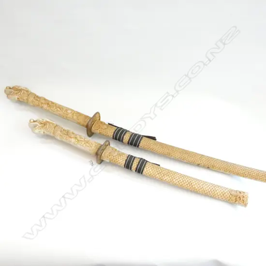 2 ORIENTAL CASED SWORDS 900MM L