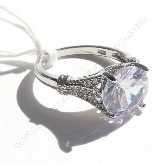 SILVER RING WITH FAUX LGE SOLITAIRE DIAMOND