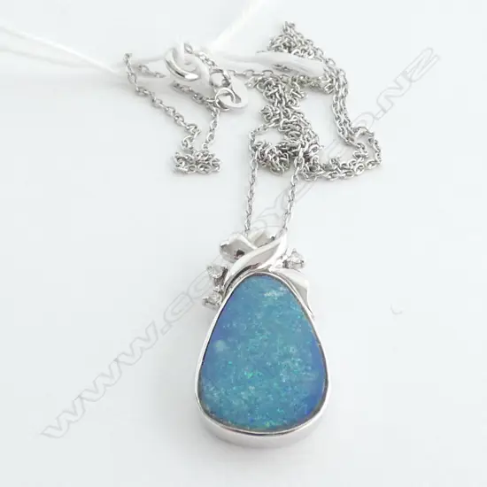 18CT WHITE GOLD OPAL AND DIAMOND PENDANT