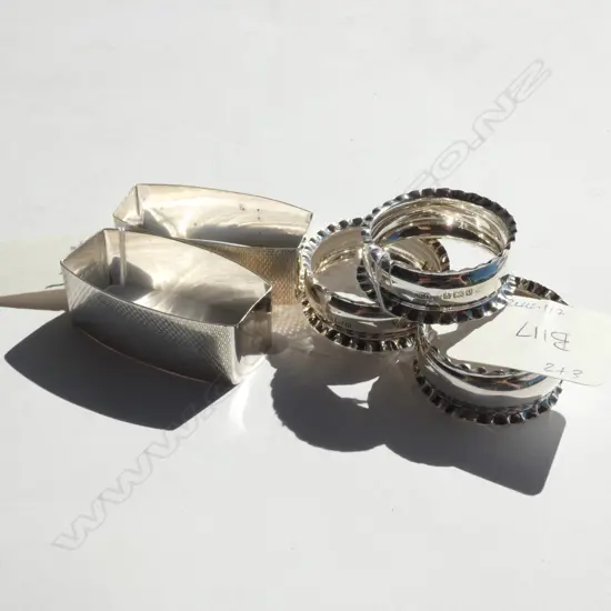 3 SILVER NAPKIN RINGS, B'HAM 1904 + 2 MARKED STERLING SILVER. TOTAL 56gm