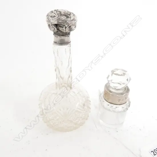 TWO STG SILVER AND CRYSTAL PERFUME BOTTLES L 1907 B 1901 H140 MM