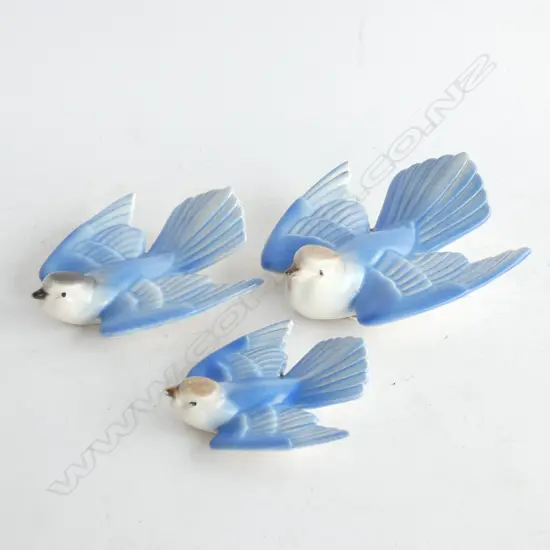 THREE POOLE SWALLOWS