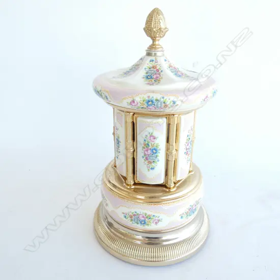 ITALIAN PORCELAIN MUSICAL CAROUSEL CIGARETTE DISPENSER H. 330MM DIA 180MM