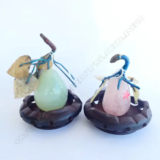 TWO PEARS W. LEAVES ON WOODEN STANDS. 1 ROSE QUARTZ & 1 GREEN CRYSOPHASE TALLEST  H 125MM