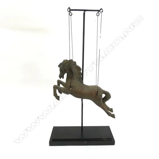 BRONZE SCULPTURE OF A CLASICAL FAIRGROUND HORSE...