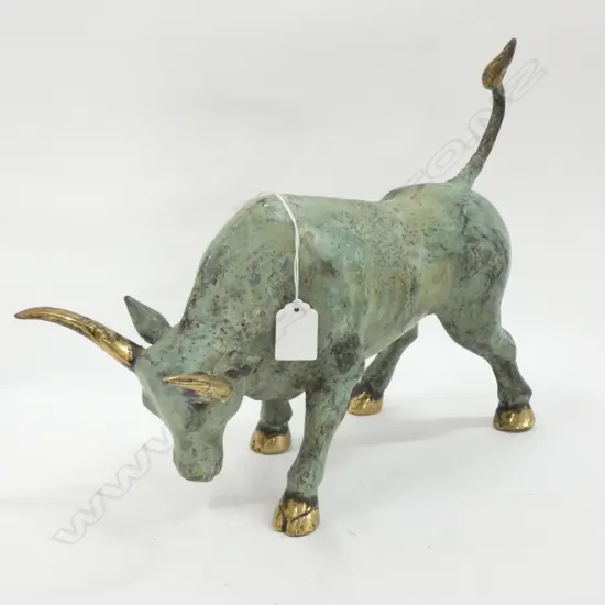 SCULPTURE OF A BRONZE BULL GREEN FINISH. L.380mm