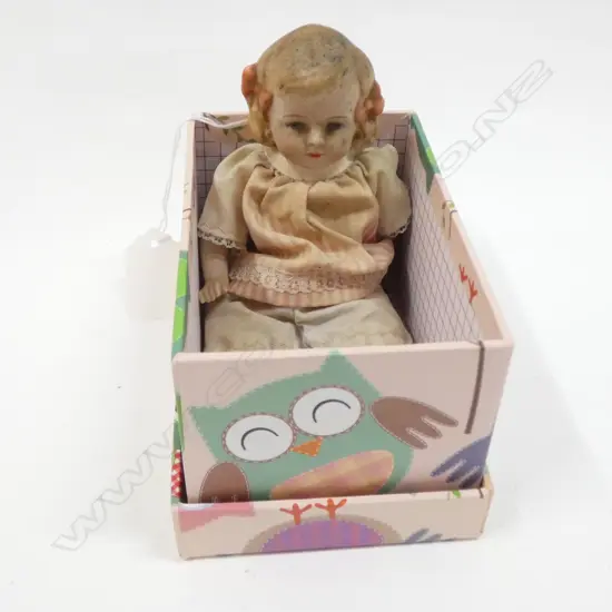 SMALL PORCELAIN DOLL