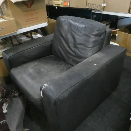 BROWN LEATHER ARM CHAIR 