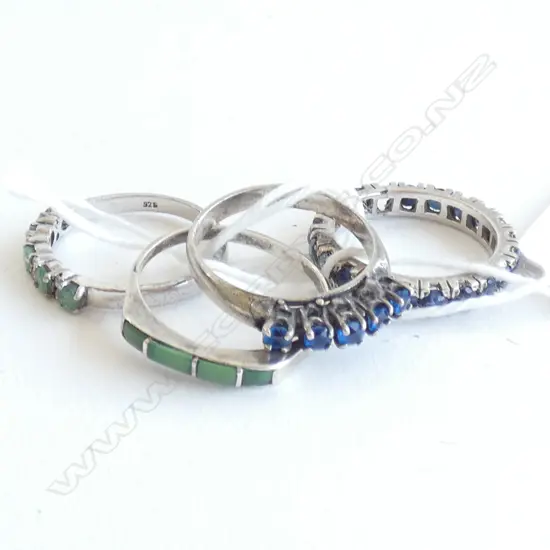 FOUR SILVER RINGS