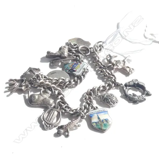 (19753) VINTAGE SILVER CHARM BRACELET 12+ CHARMS