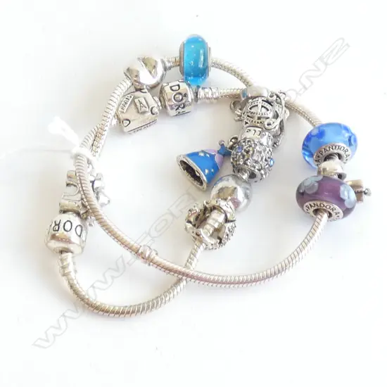 2 PANDORA BRACLETS WITH CHARMS
