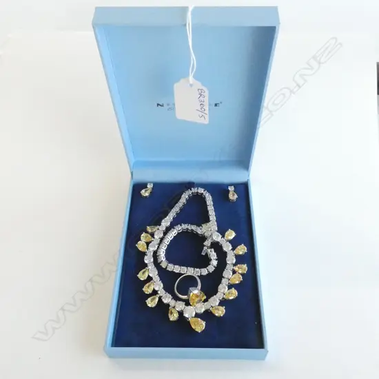 CASED COSTUME SET; NECKLACE, RING, EARRINGS