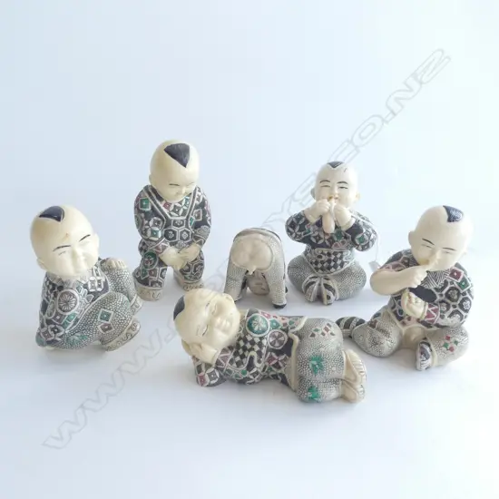 SIX ORIENTAL COMICAL MONK  FAUX CARVED IVORY FIGURES . H. 115MM